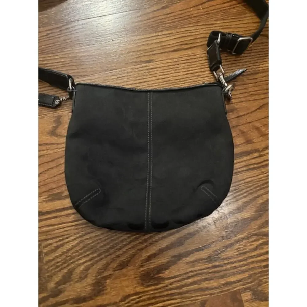 Coach crossbody handbag purse adjustable strap black jacquard logo spellout